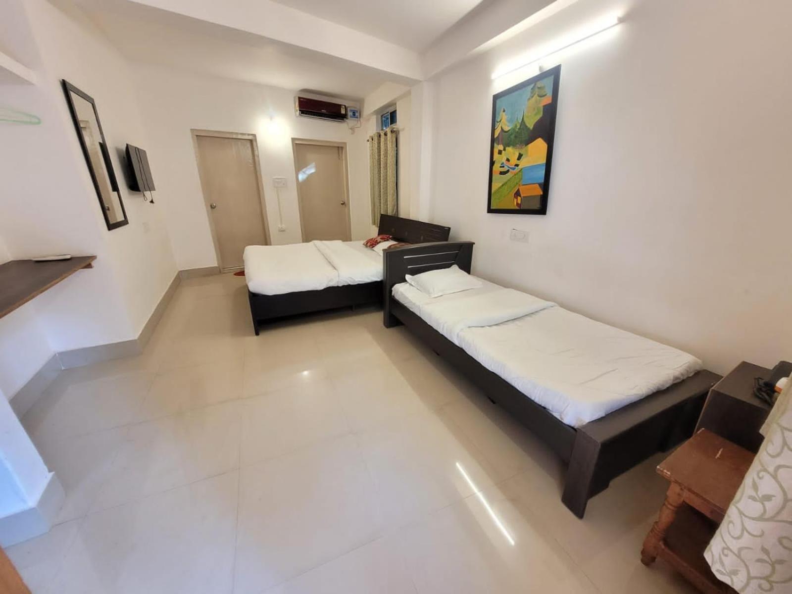 גווהטי Hilltop Lodge חדר תמונה