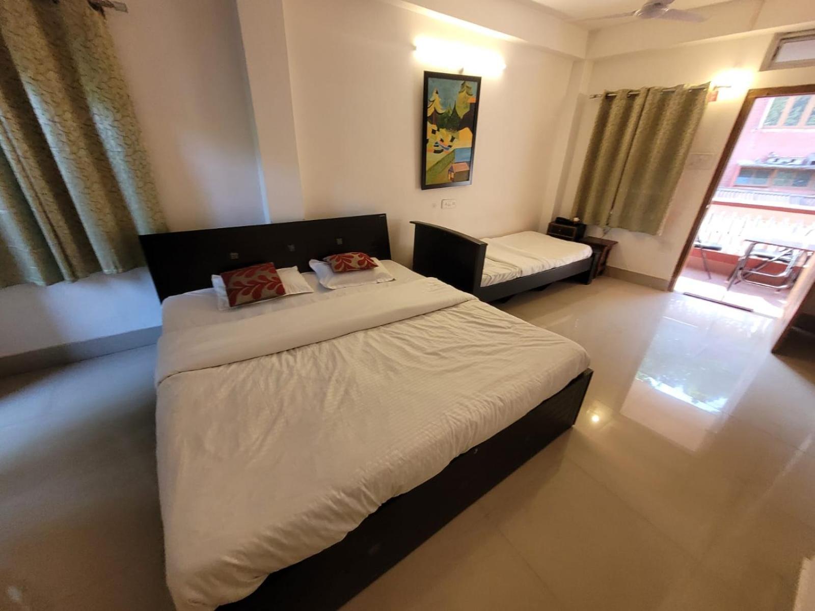 גווהטי Hilltop Lodge חדר תמונה
